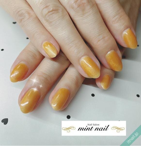 ふわっと香るキンモクセイのよう オレンジのニュアンスネイル帖